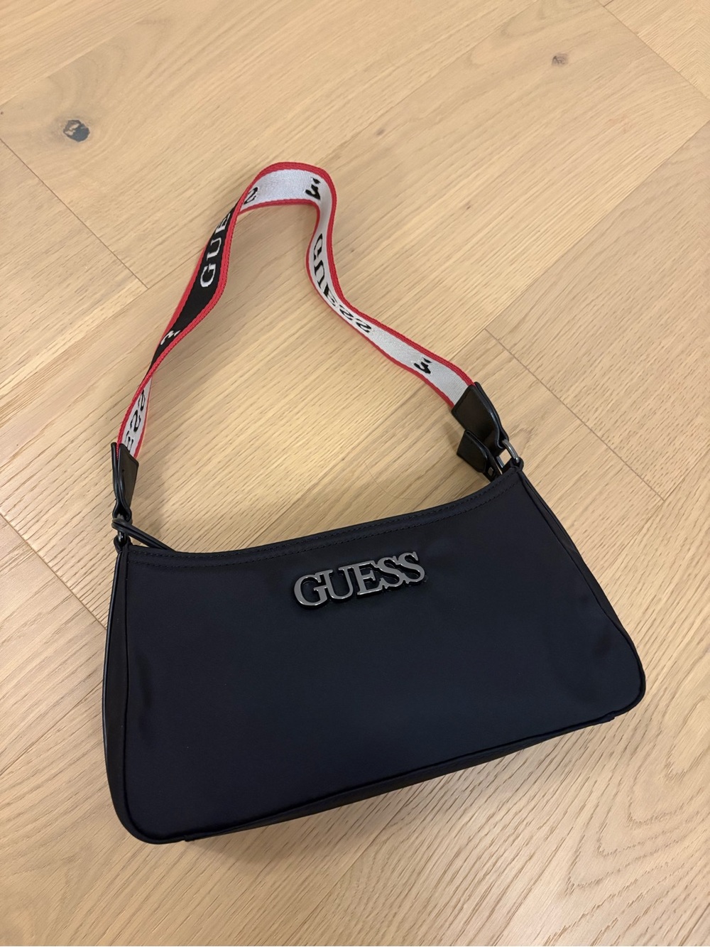 GUESS Black Shoulder Bag with Red and White Branded Strap